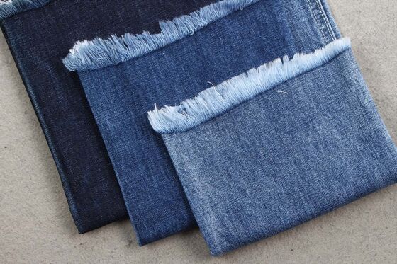 Soft 9.5oz 100% cotton denim fabric desizing cross hatch slub jeans fabric for men wear